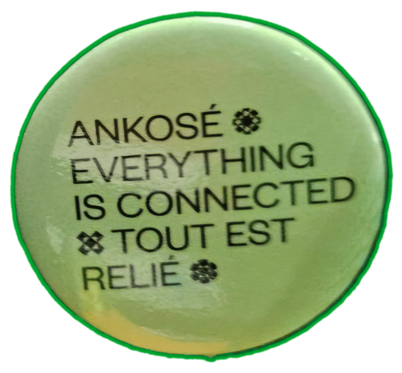 round button colored green with three sentences: 1. Ankose 2. Everything is connected 3. Tout est relie